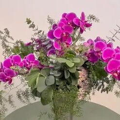 Multi purple orchids Vase arrangement